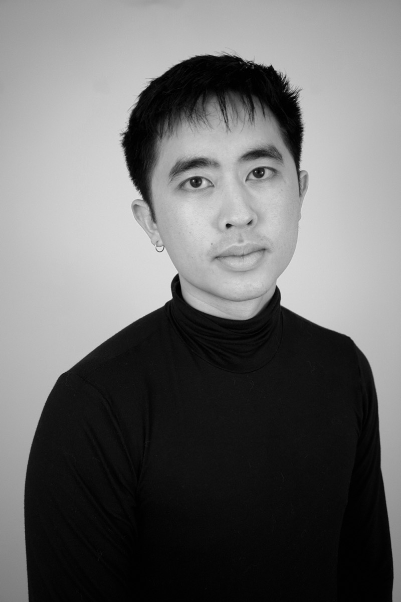 A black and white studio portrait of Nathan Cheng in a black turtleneck.